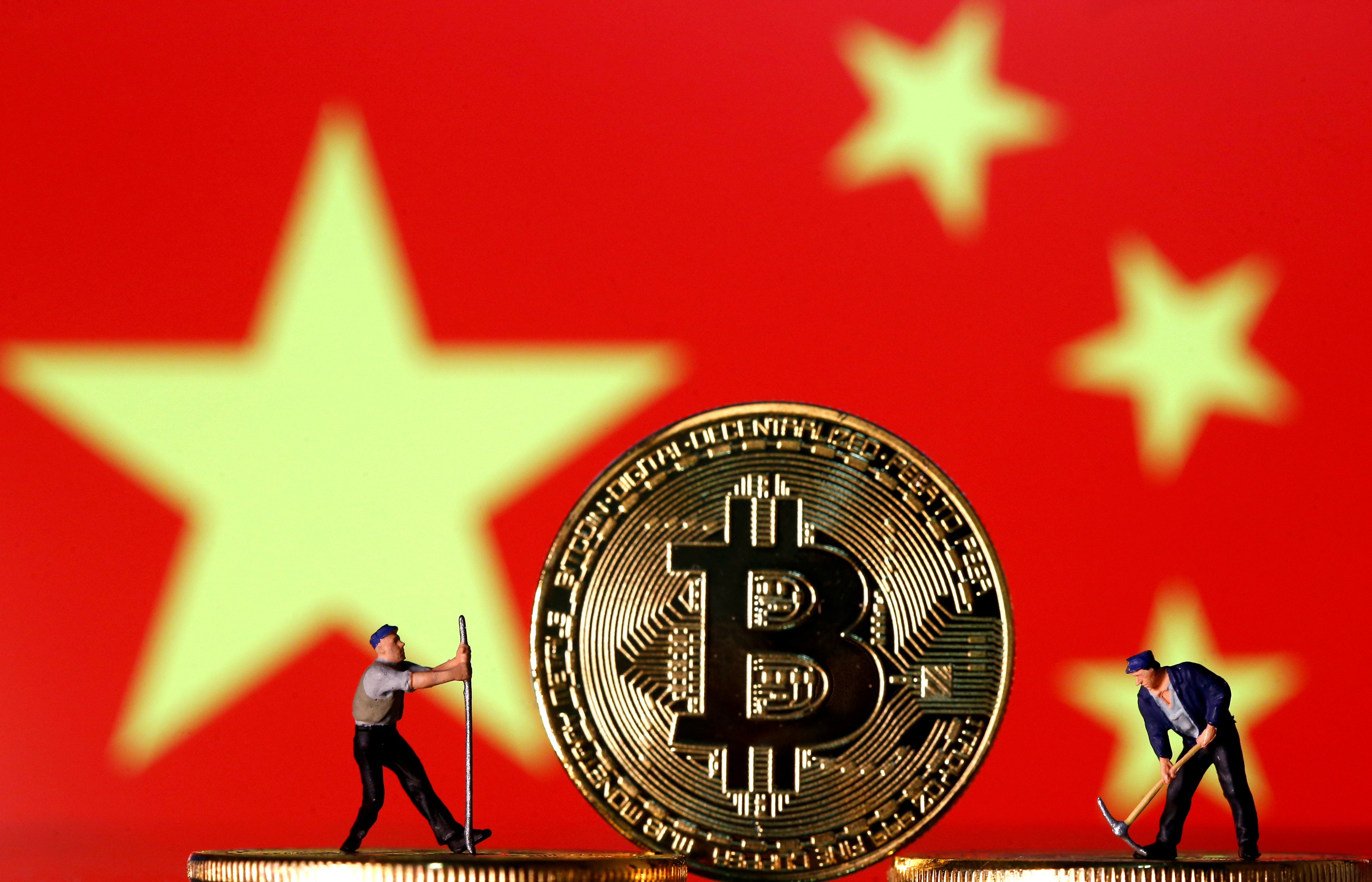 China's top regulators ban crypto trading and mining, sending bitcoin tumbling | Reuters