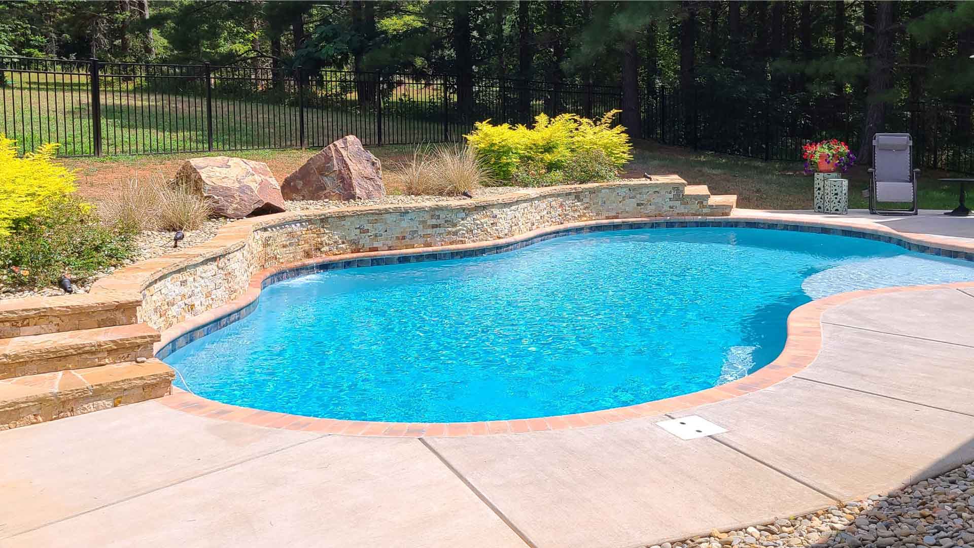 Swimming Pool with Raised & Reverse Bond Beams | The Pool Company Construction